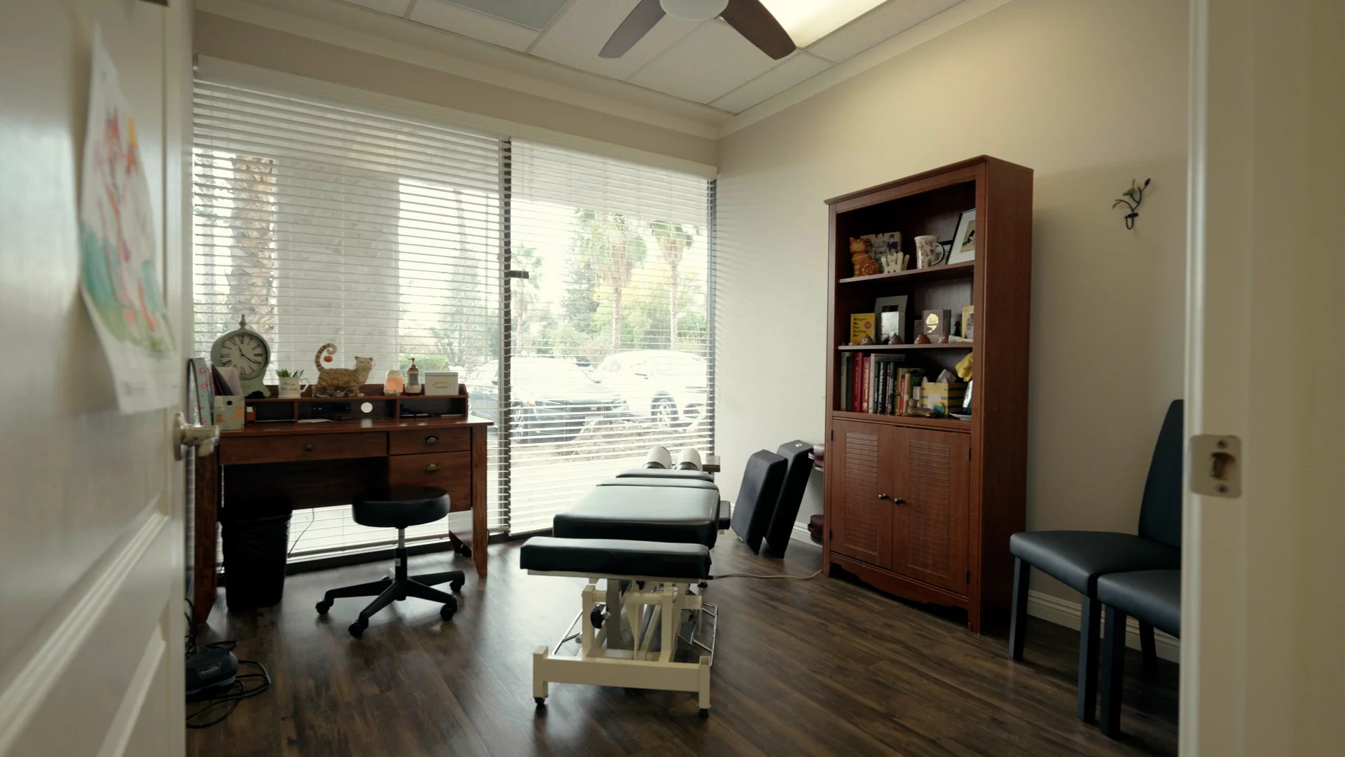 Second chiropractic treatment room with adjustment table and natural light at The Natural Path Health Center