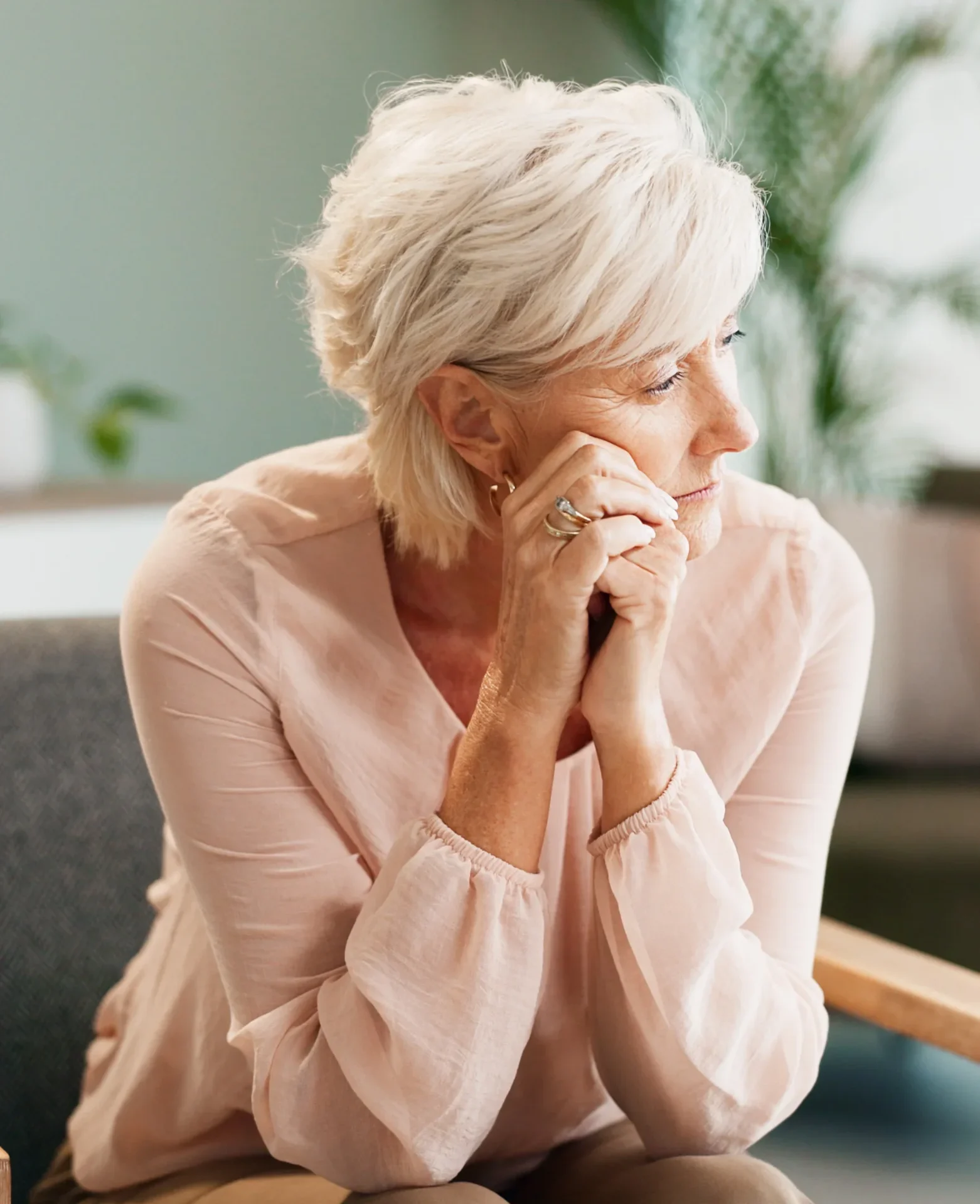 Thoughtful woman reflecting on brain wellness